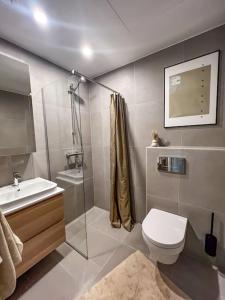 Phòng tắm tại Lumignon Tallinn City centre apartment with free parking spot +7 ảnh