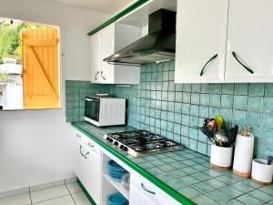 Kuchyň nebo kuchyňský kout v ubytování Villa KAZ A ZOT