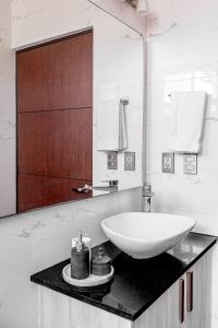 Phòng tắm tại Acogedor apartamento con alberca