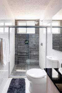 Phòng tắm tại Acogedor apartamento con alberca