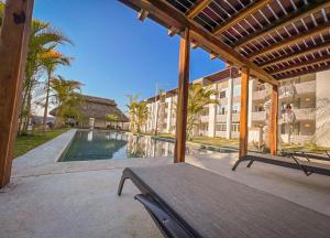 Hồ bơi trong/gần Acogedor apartamento con alberca