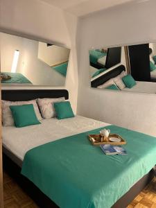 Ένα ή περισσότερα κρεβάτια σε δωμάτιο στο Stan na dan Kozarska Dubica