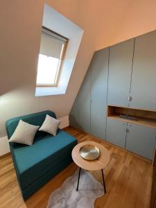 Zona d'estar a Apartman Lara - Divčigora