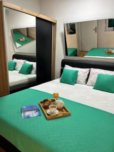 Ένα ή περισσότερα κρεβάτια σε δωμάτιο στο Stan na dan Kozarska Dubica