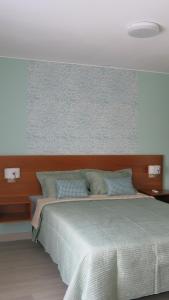 Postel nebo postele na pokoji v ubytování Hotel San Blas