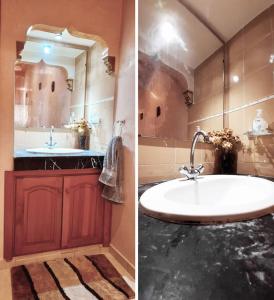 uma casa de banho com um lavatório e um espelho grande em Panoramic view of downtown Rabat em Rabat