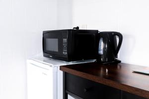 Fotografie z fotogalerie ubytování Rustic Rails Accommodation v destinaci Dargaville + 10 fotografií