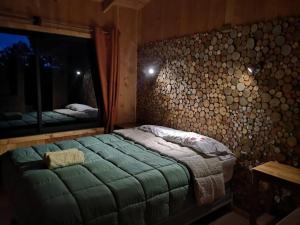Postel nebo postele na pokoji v ubytování Hostel Calafquen Adventure Coñaripe + 23 fotografií