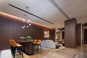 Istumisnurk majutusasutuses Hampton by Hilton Guangzhou Xintang