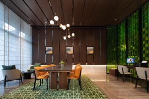 Istumisnurk majutusasutuses Hampton by Hilton Guangzhou Xintang