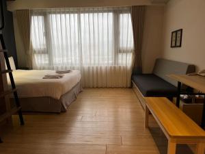 Katil atau katil-katil dalam bilik di NK Hostel