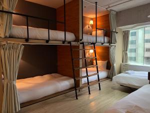 Katil atau katil-katil dalam bilik di NK Hostel