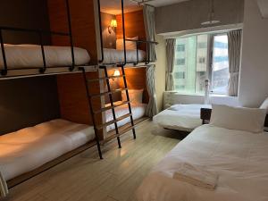 Katil atau katil-katil dalam bilik di NK Hostel
