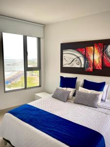 Postel nebo postele na pokoji v ubytování Apartamento con espectacular vista al oceano + 9 fotografií