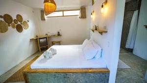 Voodi või voodid majutusasutuse Serenity Hotel toas