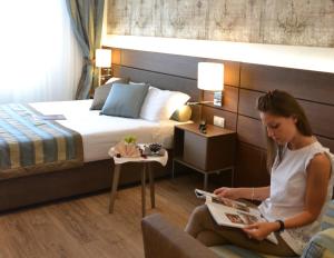 Posteľ alebo postele v izbe v ubytovaní LH Hotel Sirio Venice