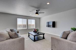 a living room with two couches and a coffee table at Countryside Classic in Nampa