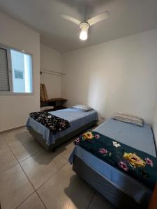 Кровать или кровати в номере Apê212 - 650m da Orla