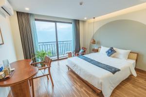 Postel nebo postele na pokoji v ubytování Sapa Yen Hotel
