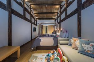 Postel nebo postele na pokoji v ubytování Hangshe Hostel Fuzhou