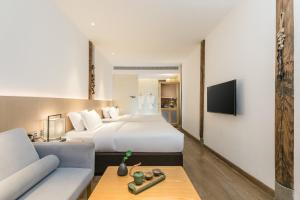 TV a/nebo společenská místnost v ubytování Hangshe Hostel Fuzhou