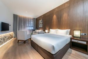 Postel nebo postele na pokoji v ubytování Hangshe Hostel Fuzhou