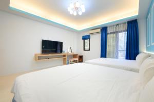Postel nebo postele na pokoji v ubytování Sunshine B&B