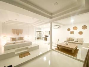 Postel nebo postele na pokoji v ubytování Elephant Beach Club & Resort Samui + 37 fotografií