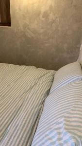 A bed or beds in a room at Daughter and son