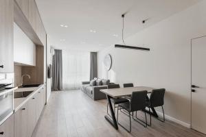Kuchyňa alebo kuchynka v ubytovaní Noviy Bereg Design Apartment