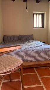 A bed or beds in a room at Daughter and son