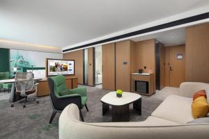 Televiisor ja/või meelelahutuskeskus majutusasutuses Hampton by Hilton Guangzhou Xintang