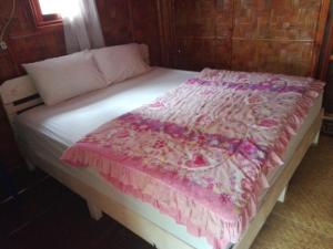 En eller flere senger på et rom på sainamhoun guesthouse