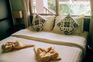 Postel nebo postele na pokoji v ubytování Tina Holiday Homes