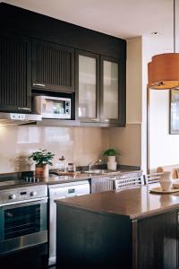 Kuchyň nebo kuchyňský kout v ubytování Tina Holiday Homes