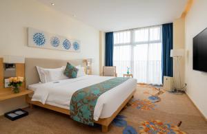 Krevet ili kreveti u jedinici u okviru objekta 石家庄华强诺华廷酒店 Novlion hotel