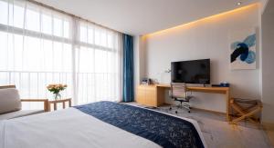 TV i/ili multimedijalni sistem u objektu 石家庄华强诺华廷酒店 Novlion hotel