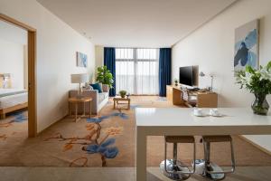 TV i/ili multimedijalni sistem u objektu 石家庄华强诺华廷酒店 Novlion hotel
