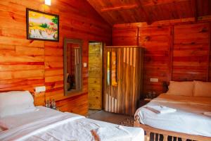 Postel nebo postele na pokoji v ubytování O3 Beach Resort