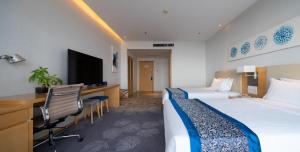 TV i/ili multimedijalni sistem u objektu 石家庄华强诺华廷酒店 Novlion hotel