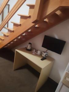 TV a/nebo společenská místnost v ubytování Garnì Bonsai