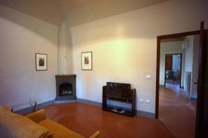 TV a/nebo společenská místnost v ubytování Volterra - Palazzo Contugi xiv Sec