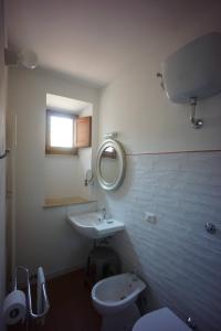 Koupelna v ubytování Volterra - Palazzo Contugi xiv Sec + 19 fotografií