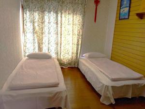 Uma cama ou camas num quarto em 花源