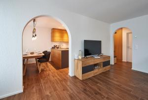 TV a/nebo společenská místnost v ubytování Residence Eden by Arosa Vacations