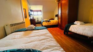 Postel nebo postele na pokoji v ubytování Casa Simona