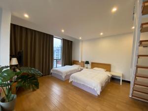 Katil atau katil-katil dalam bilik di 林涧小栈Linger house