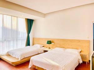 Katil atau katil-katil dalam bilik di 林涧小栈Linger house