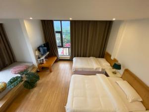 Katil atau katil-katil dalam bilik di 林涧小栈Linger house