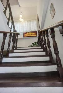 a set of stairs in a house with at Royal Duchess Pension in Puerto Princesa City